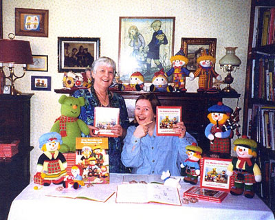 Jean and Victoria signing books